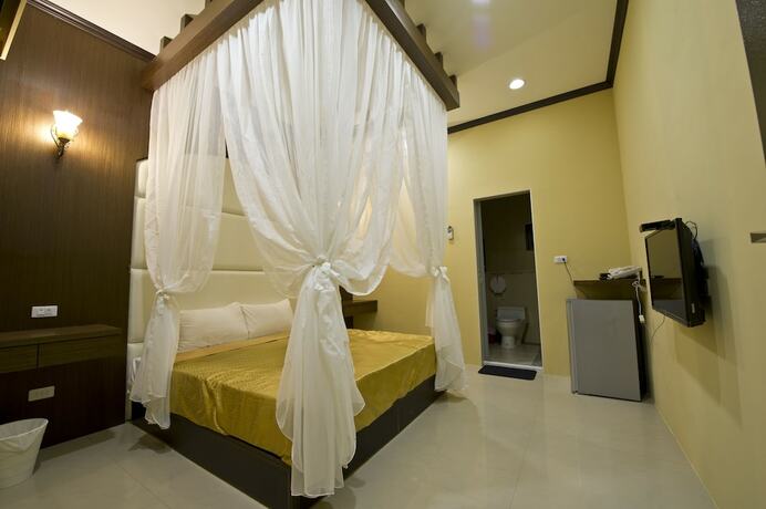 Imagen de la habitación del Hotel Donggang Neptune Hall. Foto 22