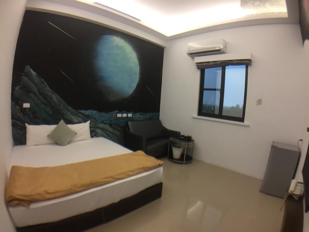 Imagen de la habitación del Hotel Donggang Neptune Hall. Foto 23