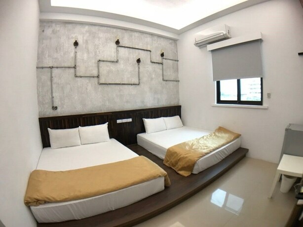 Imagen de la habitación del Hotel Donggang Neptune Hall. Foto 28