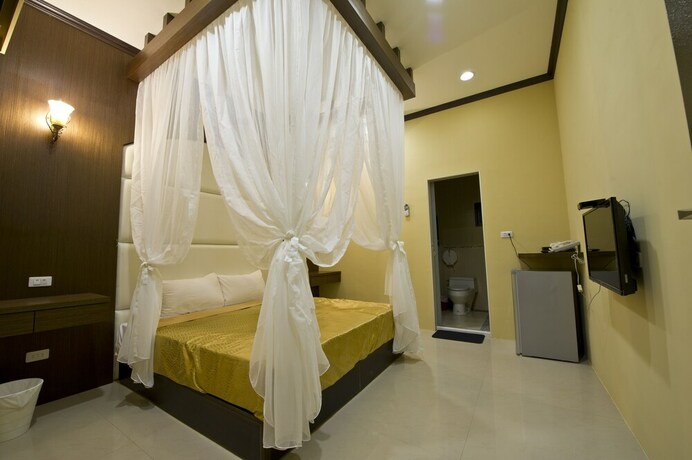 Imagen de la habitación del Hotel Donggang Neptune Hall. Foto 29