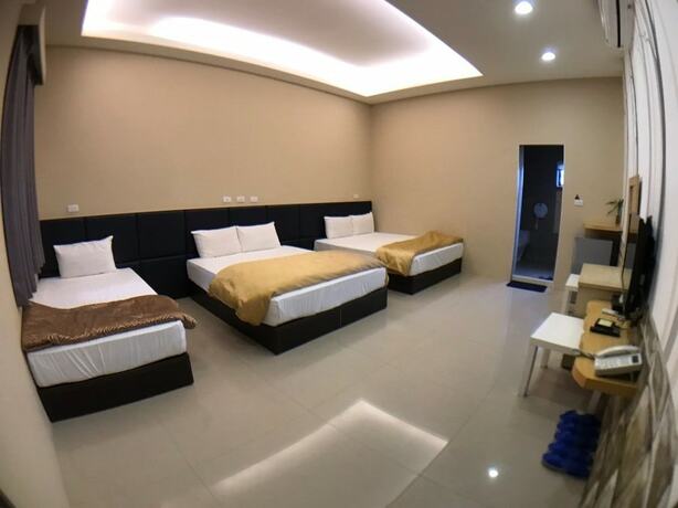 Imagen de la habitación del Hotel Donggang Neptune Hall. Foto 31