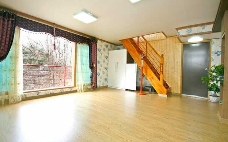 Imagen de la habitación del Hotel Donggang Village Caravan Pension. Foto 10