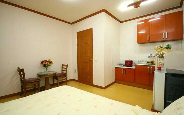 Imagen de la habitación del Hotel Donggang Village Caravan Pension. Foto 15