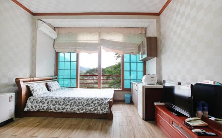 Imagen de la habitación del Hotel Donggang Village Caravan Pension. Foto 19