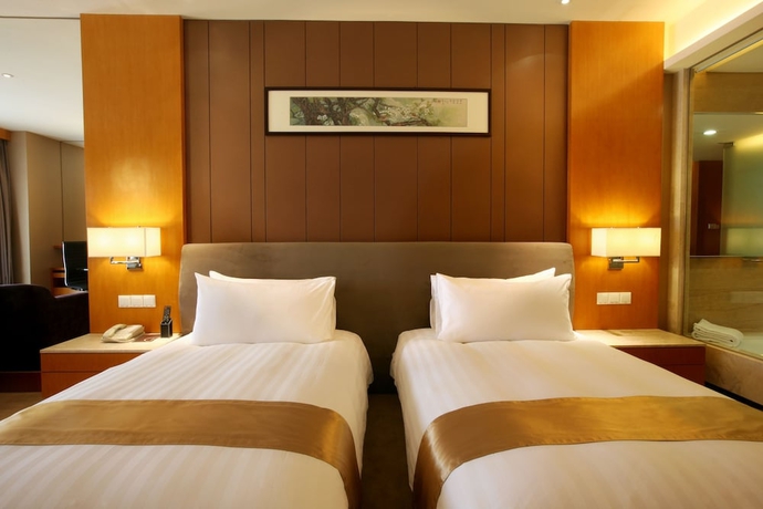 Imagen de la habitación del Hotel Dongguan Forum Hotel and Apartment. Foto 11