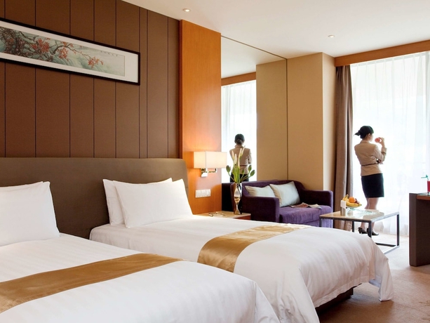 Imagen de la habitación del Hotel Dongguan Forum Hotel and Apartment. Foto 14