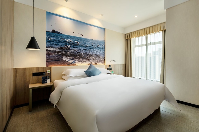 Imagen de la habitación del Hotel Dongguan Haili. Foto 12