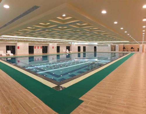 Imagen de la habitación del Hotel Dongguan Mankater International. Foto 8