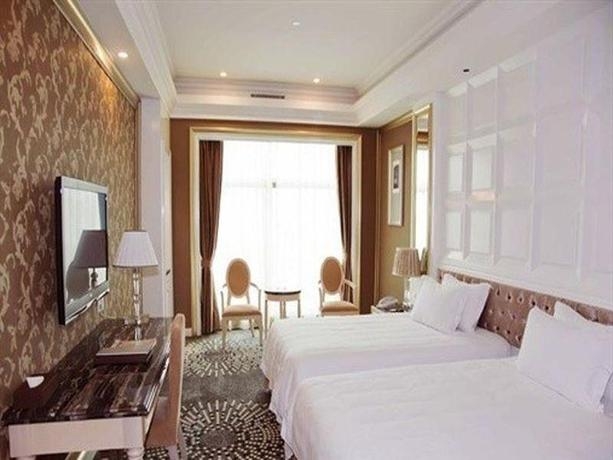 Imagen de la habitación del Hotel Dongguan Silver Holiday. Foto 4