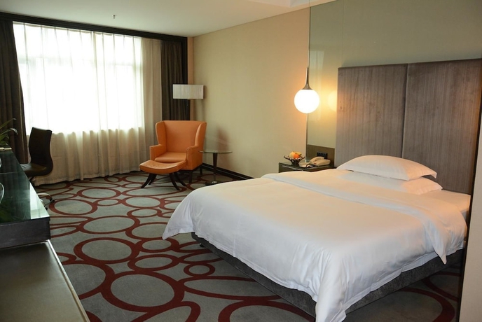 Imagen de la habitación del Hotel Dongguan Silverworld Garden. Foto 6