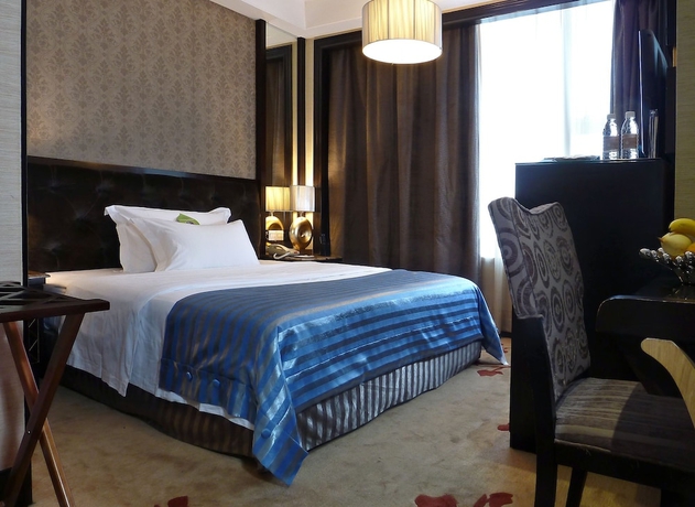 Imagen de la habitación del Hotel Dongguan Silverworld Garden. Foto 9