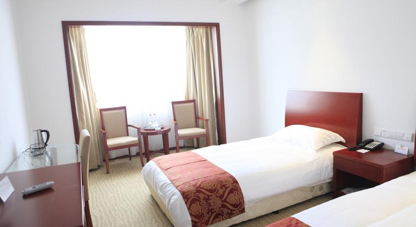 Imagen de la habitación del Hotel Donghua University Hotel. Foto 3