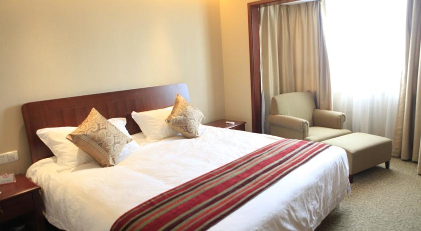 Imagen de la habitación del Hotel Donghua University Hotel. Foto 4