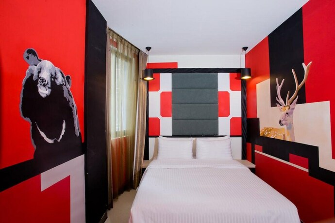 Imagen de la habitación del Hotel Dongmen. Foto 12