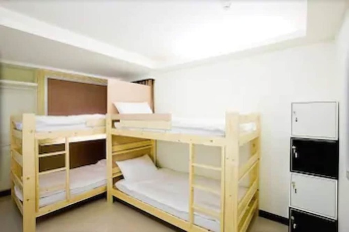 Imagen de la habitación del Hotel Dongmen. Foto 14