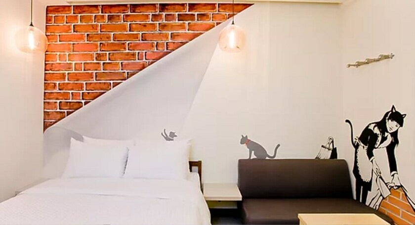 Imagen de la habitación del Hotel Dongmen. Foto 15