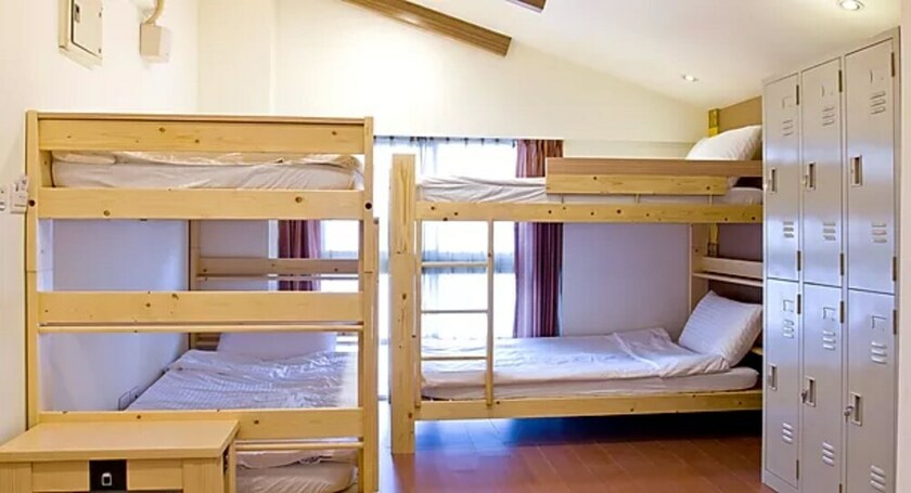 Imagen de la habitación del Hotel Dongmen. Foto 19