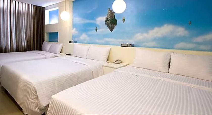 Imagen de la habitación del Hotel Dongmen. Foto 30