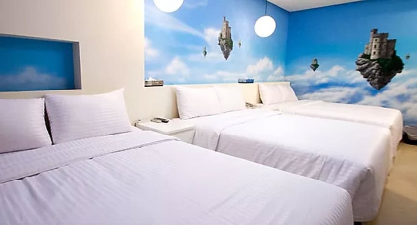 Imagen de la habitación del Hotel Dongmen. Foto 32