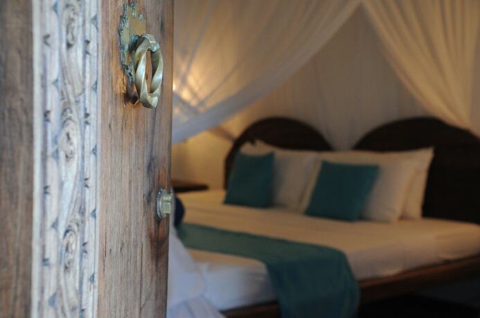 Imagen de la habitación del Hotel Dongwe Club. Foto 18