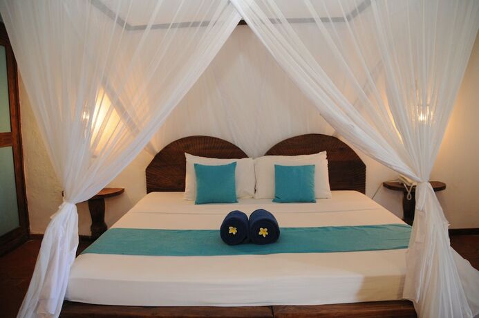 Imagen de la habitación del Hotel Dongwe Club. Foto 19