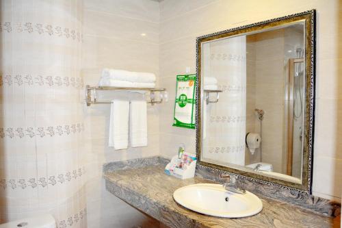 Imagen de la habitación del Hotel Dongxing Dequan. Foto 5