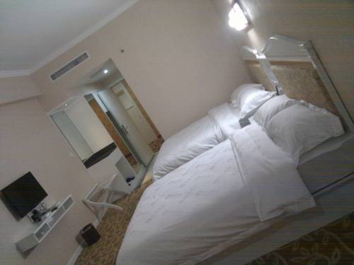 Imagen de la habitación del Hotel Dongxing Dequan. Foto 6