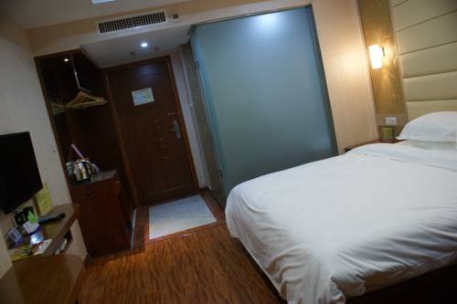 Imagen de la habitación del Hotel Dongxing Dequan. Foto 8