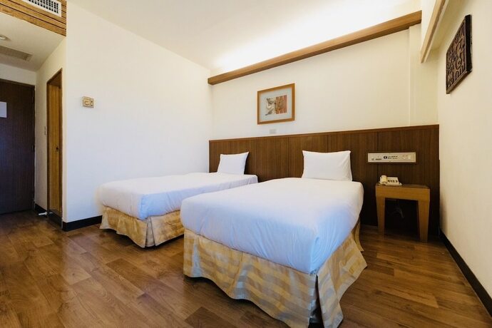 Imagen de la habitación del Hotel Dongxu Resort. Foto 14