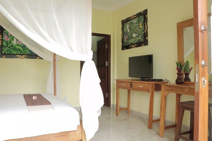 Imagen de la habitación del Hotel Doni House Villa. Foto 25