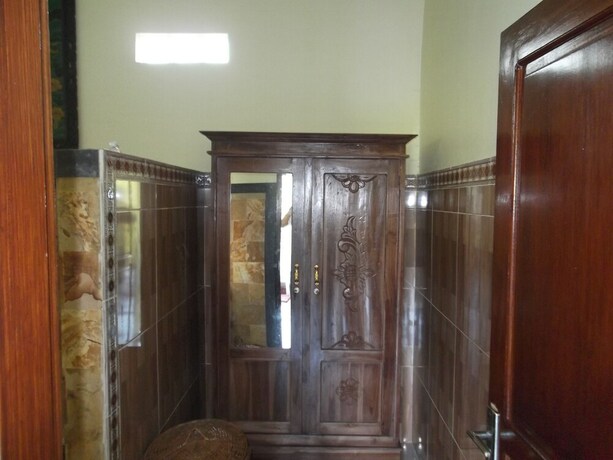 Imagen de la habitación del Hotel Doni House Villa. Foto 26