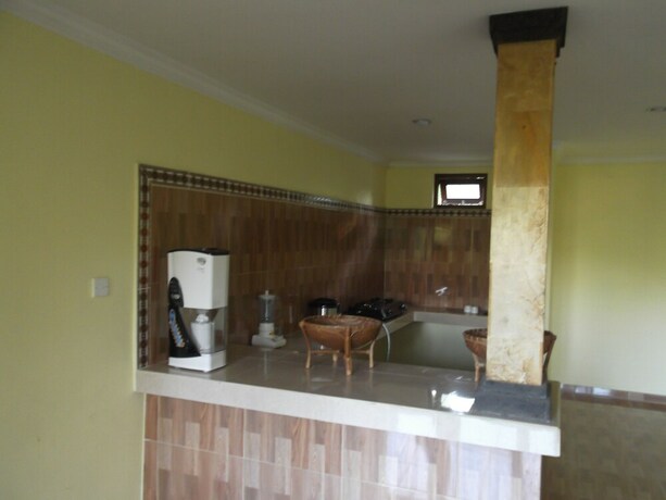 Imagen de la habitación del Hotel Doni House Villa. Foto 28