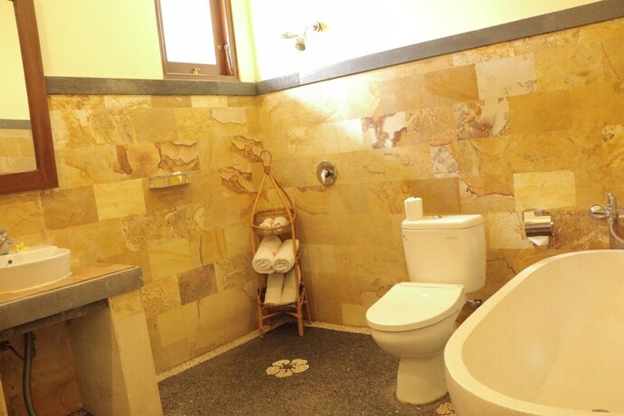 Imagen de la habitación del Hotel Doni House Villa. Foto 31