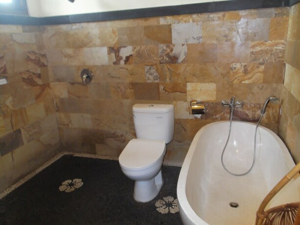 Imagen de la habitación del Hotel Doni House Villa. Foto 34