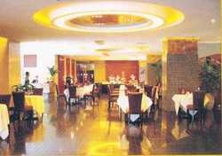 Imagen del bar/restaurante del Hotel Donlord International Hotel. Foto 4