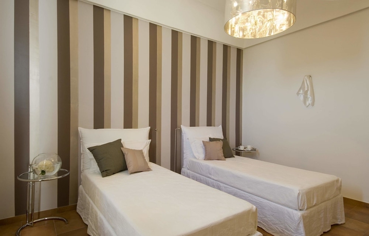 Imagen de la habitación del Hotel Donna Carmela Resort & Lodges. Foto 4