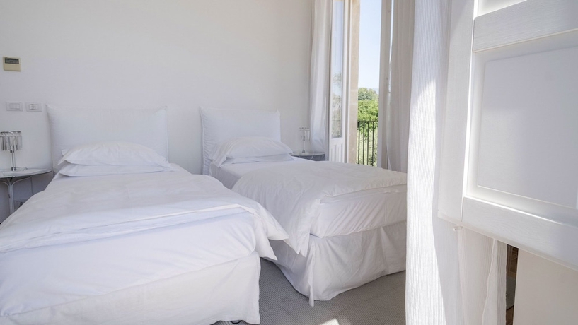 Imagen de la habitación del Hotel Donna Carmela Resort & Lodges. Foto 14