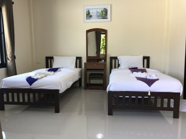 Imagen de la habitación del Hotel Donsak Ville. Foto 15