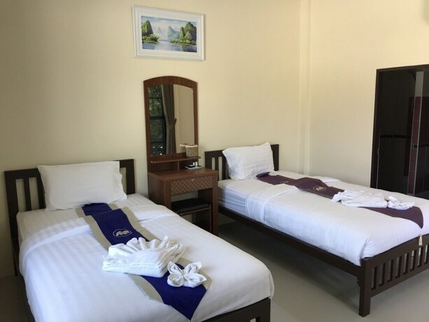 Imagen de la habitación del Hotel Donsak Ville. Foto 16