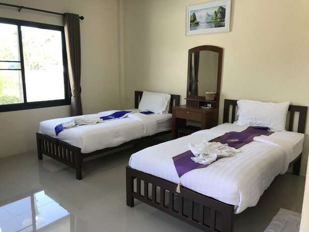 Imagen de la habitación del Hotel Donsak Ville. Foto 17