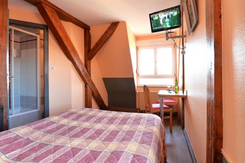 Imagen de la habitación del Hotel Dontenville. Foto 7