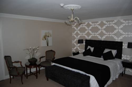 Imagen de la habitación del Hotel Dooly's. Foto 2