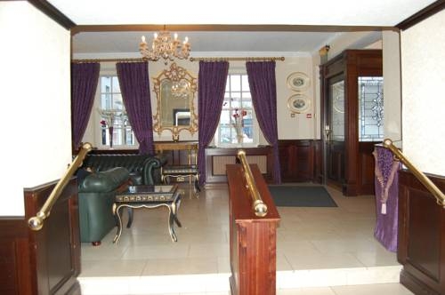 Imagen de la habitación del Hotel Dooly's. Foto 7