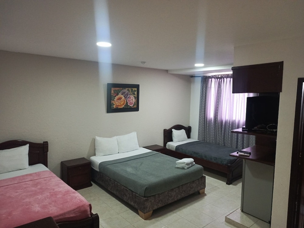 Imagen de la habitación del Hotel Dorado BAQ. Foto 2