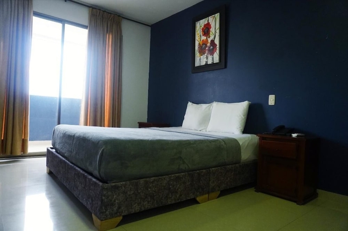 Imagen de la habitación del Hotel Dorado BAQ. Foto 12