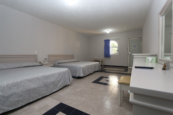 Imagen de la habitación del Hotel Dorados Conventions and Resort. Foto 7