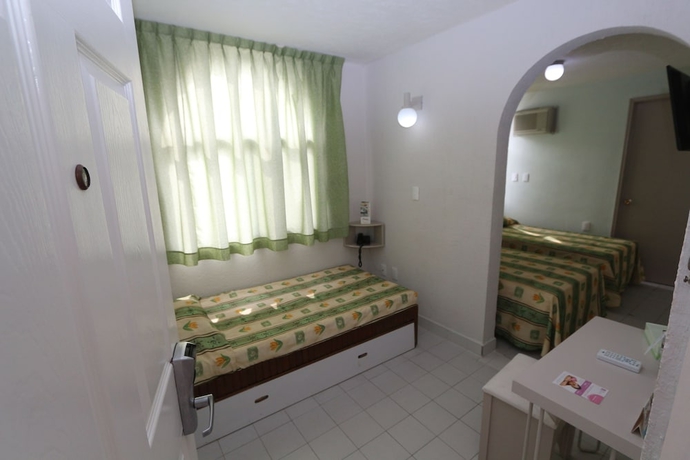 Imagen de la habitación del Hotel Dorados Conventions and Resort. Foto 17