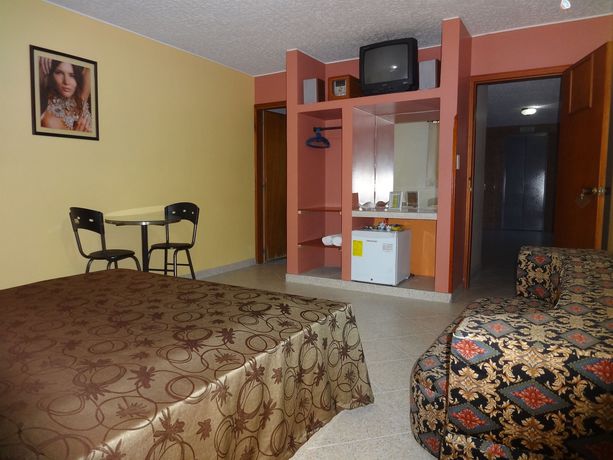 Imagen de la habitación del Hotel Doral Suites. Foto 7