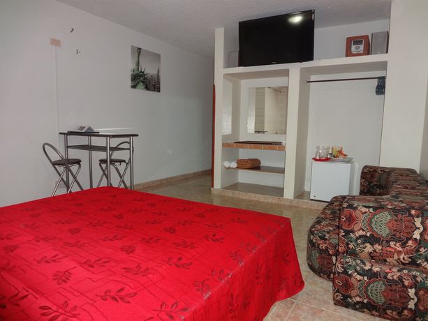 Imagen de la habitación del Hotel Doral Suites. Foto 13