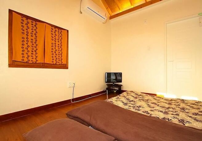 Imagen de la habitación del Hotel Doran Doran Guesthouse. Foto 17